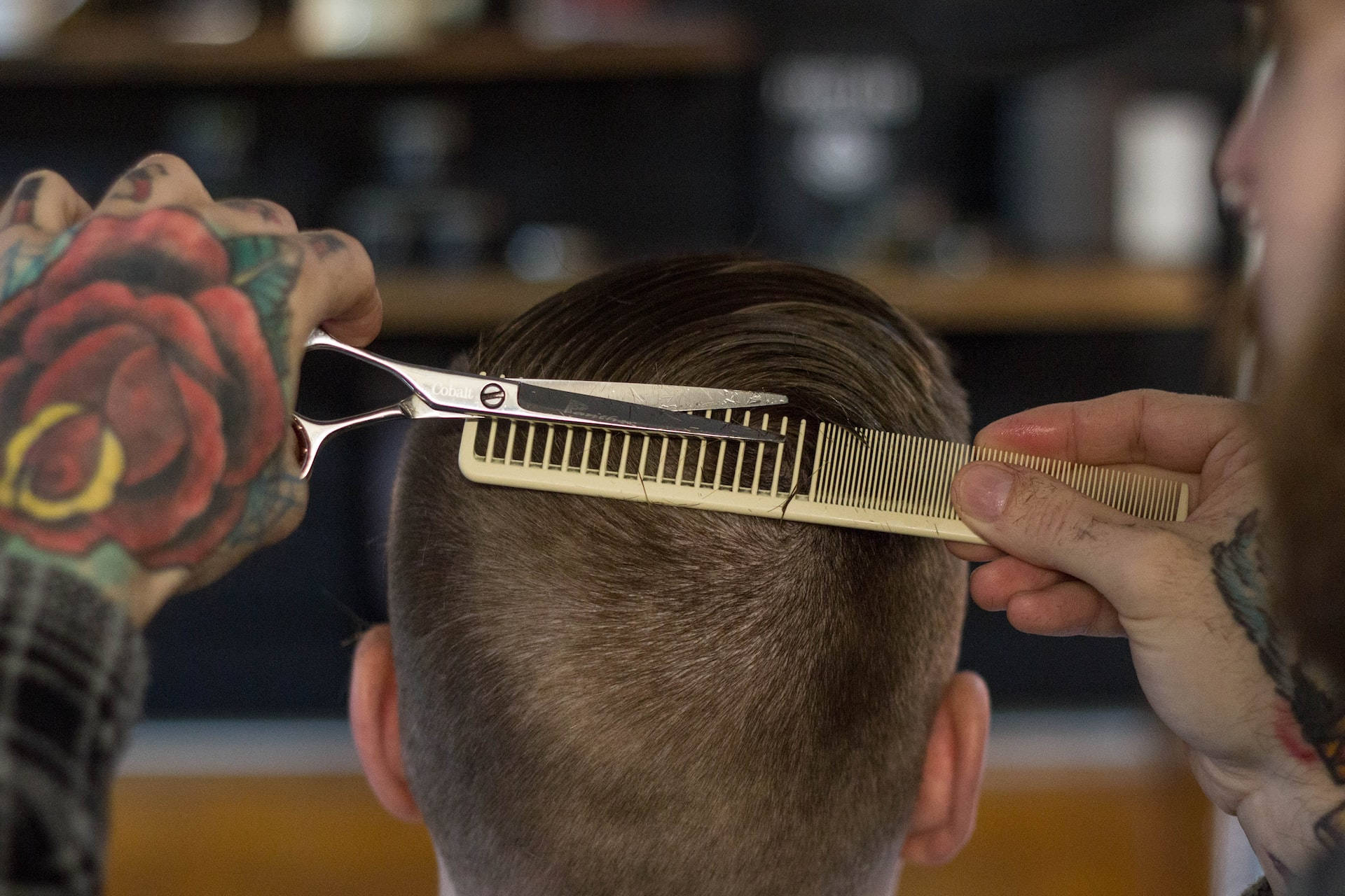 Caption:   Classy Modern Men's Haircut Wallpaper