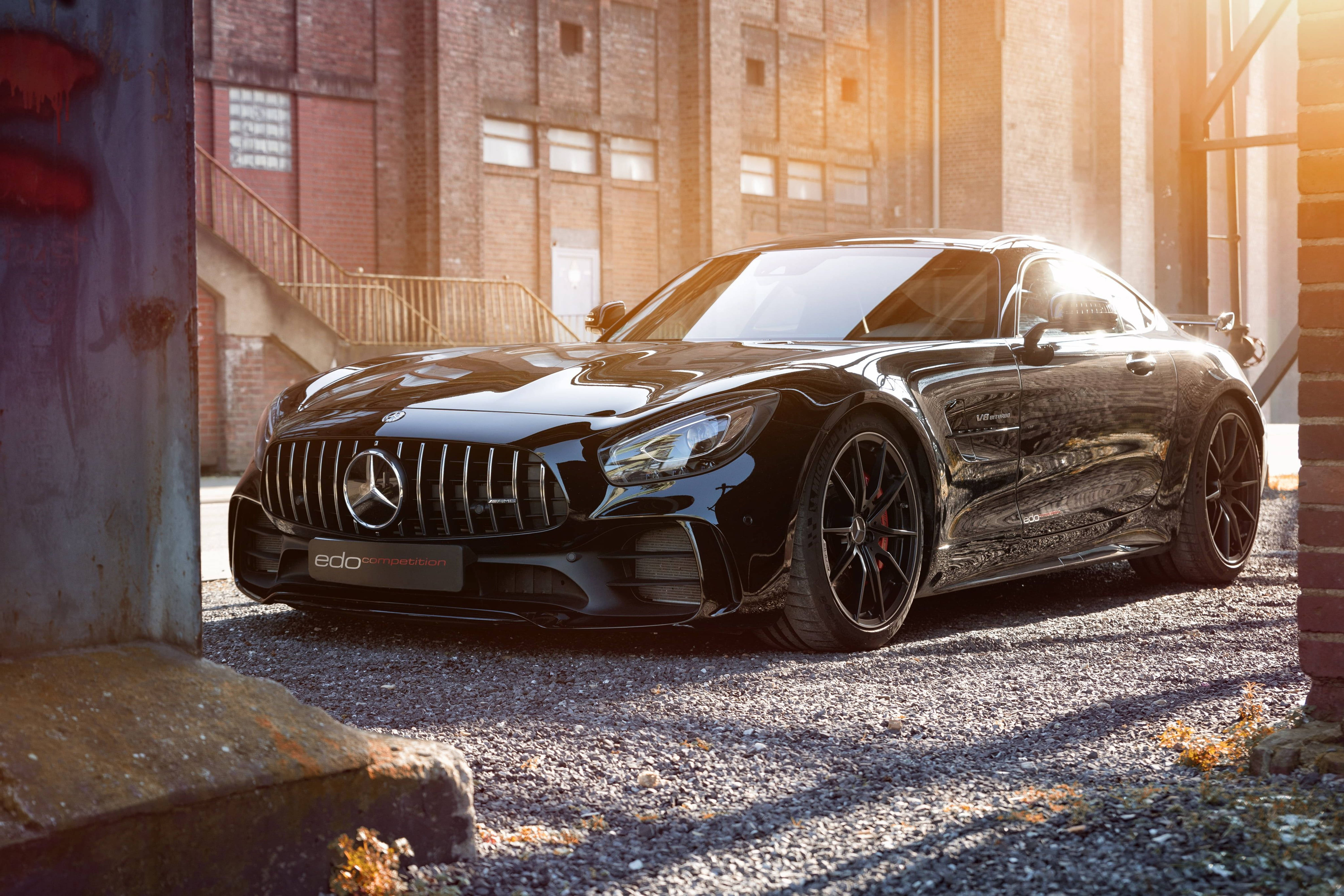 Mercedes Amg 4k With Building And Sunrise Wallpaper