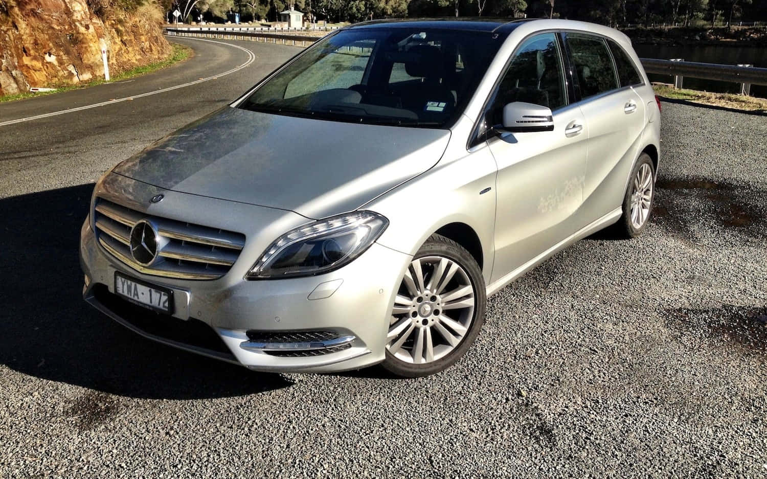 Sleek and Stylish Mercedes Benz B-class in a Cityscape Wallpaper