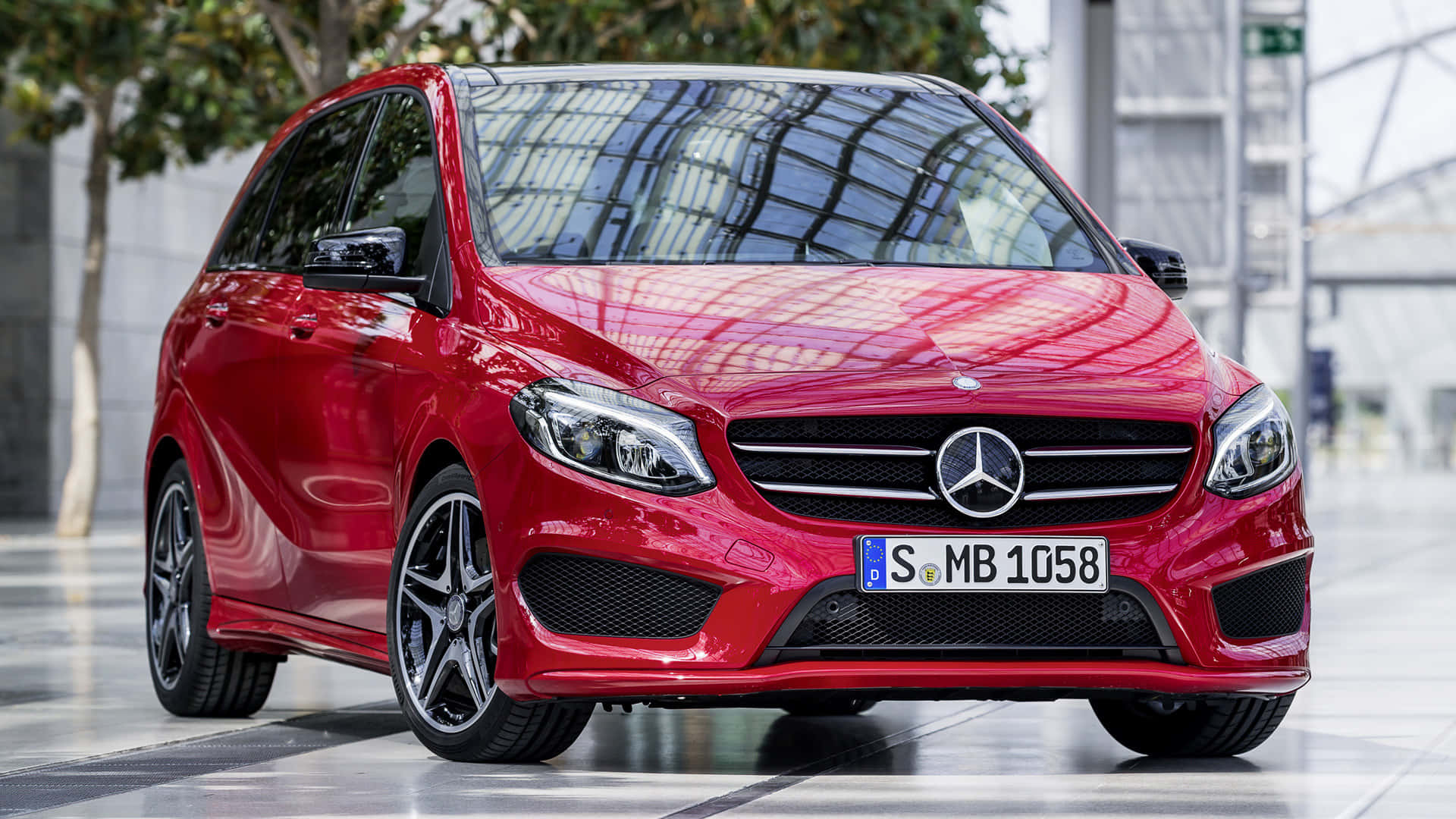 Caption: Sleek and Stylish Mercedes Benz B-Class in Action Wallpaper