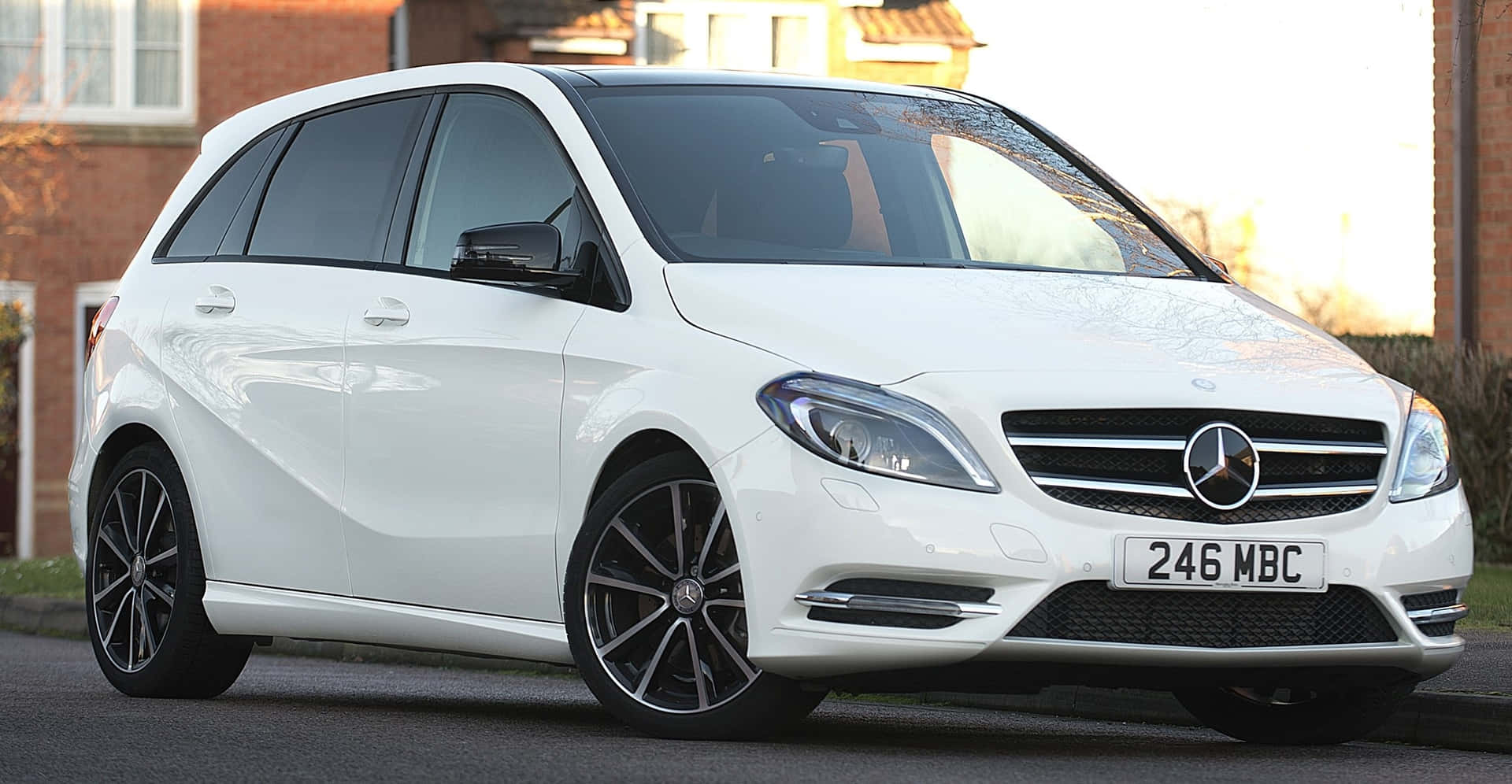 Sleek and Stylish Mercedes Benz B-Class on the Road Wallpaper