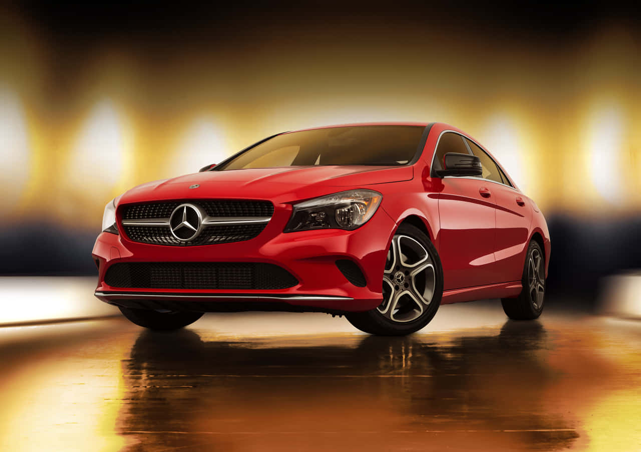 Sleek and Stylish Mercedes Benz CLA-Class in Motion Wallpaper