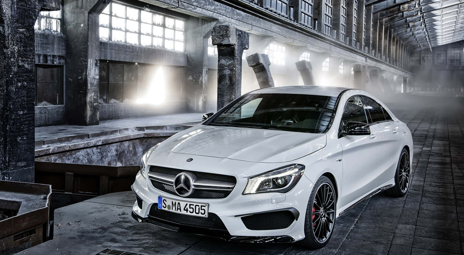 Sleek and Stylish Mercedes Benz CLA-Class on the Road Wallpaper