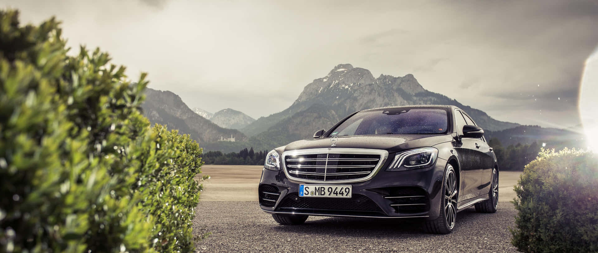 Mercedes S-class Parked In Front Of Mountains Wallpaper