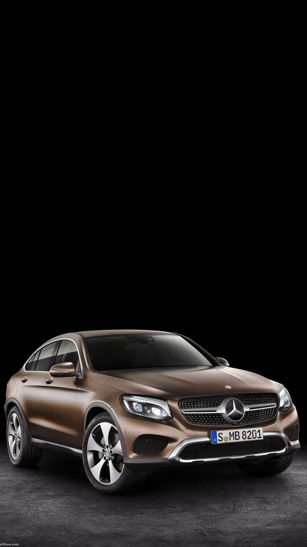 The Mercedes C Class Coupe Is Shown In A Dark Background Wallpaper