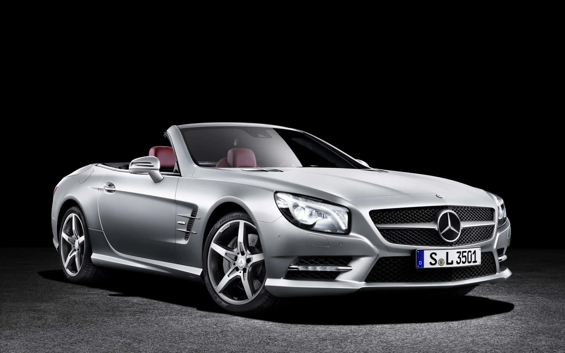 Sleek and Stylish Mercedes Benz SL-Class Convertible on the Road Wallpaper