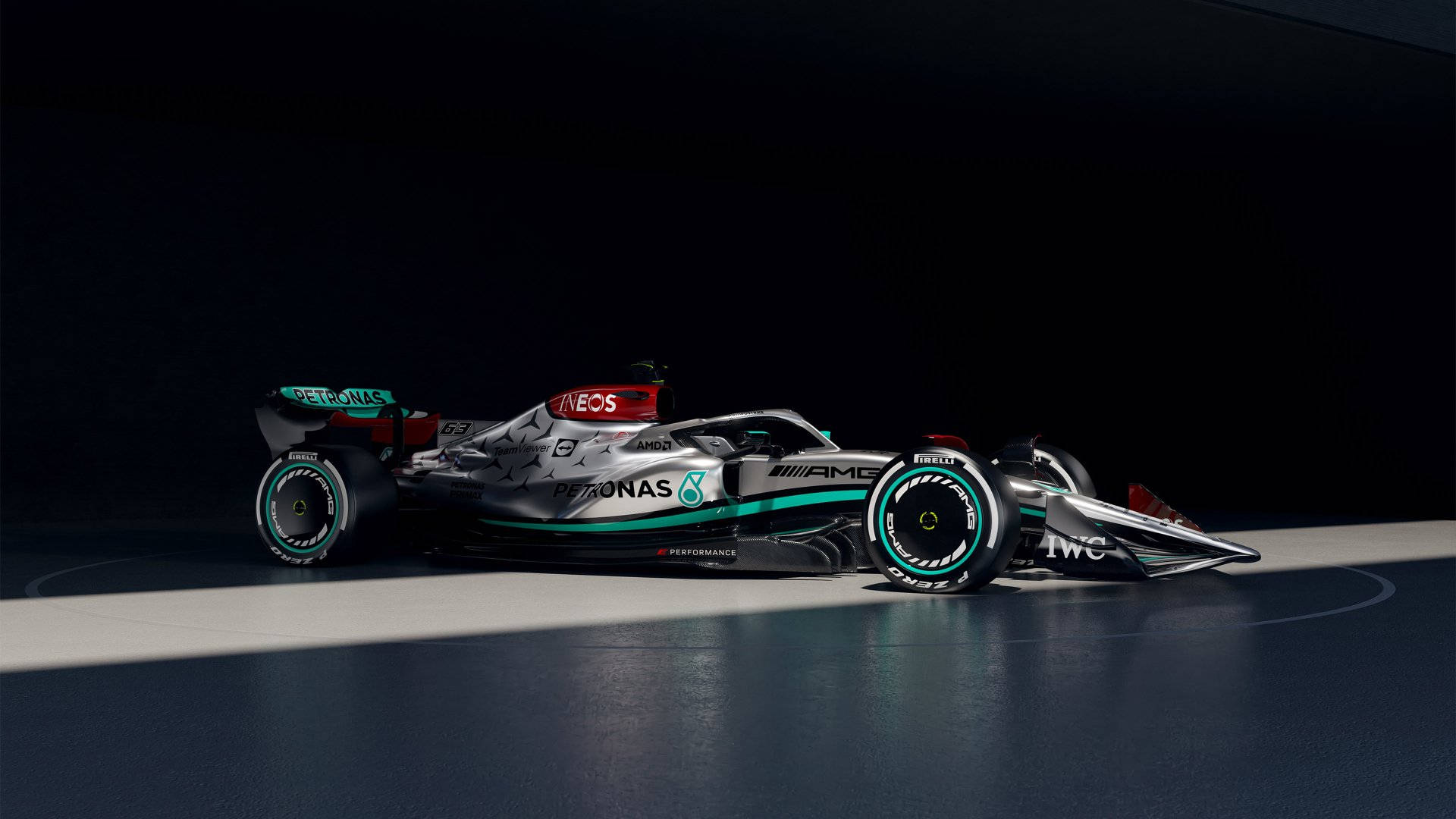 Få et adrenalinkick med Mercedes F1 iPhone baggrund. Wallpaper