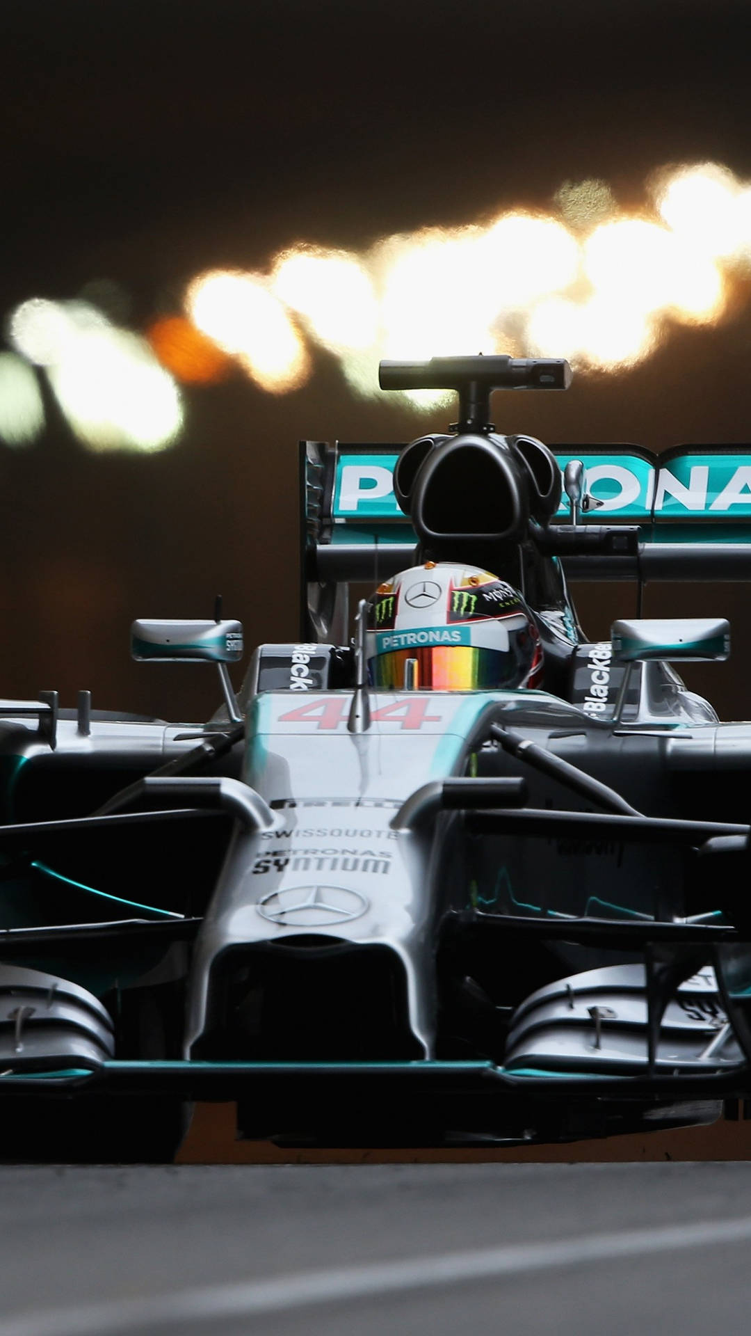 "F1 Racing at Your Fingertips with the Mercedes F1 iPhone" Wallpaper