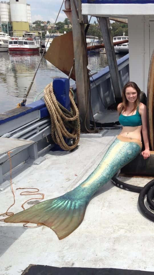 Glistening in the Sun, a Real-Life Mermaid Visits the Coast