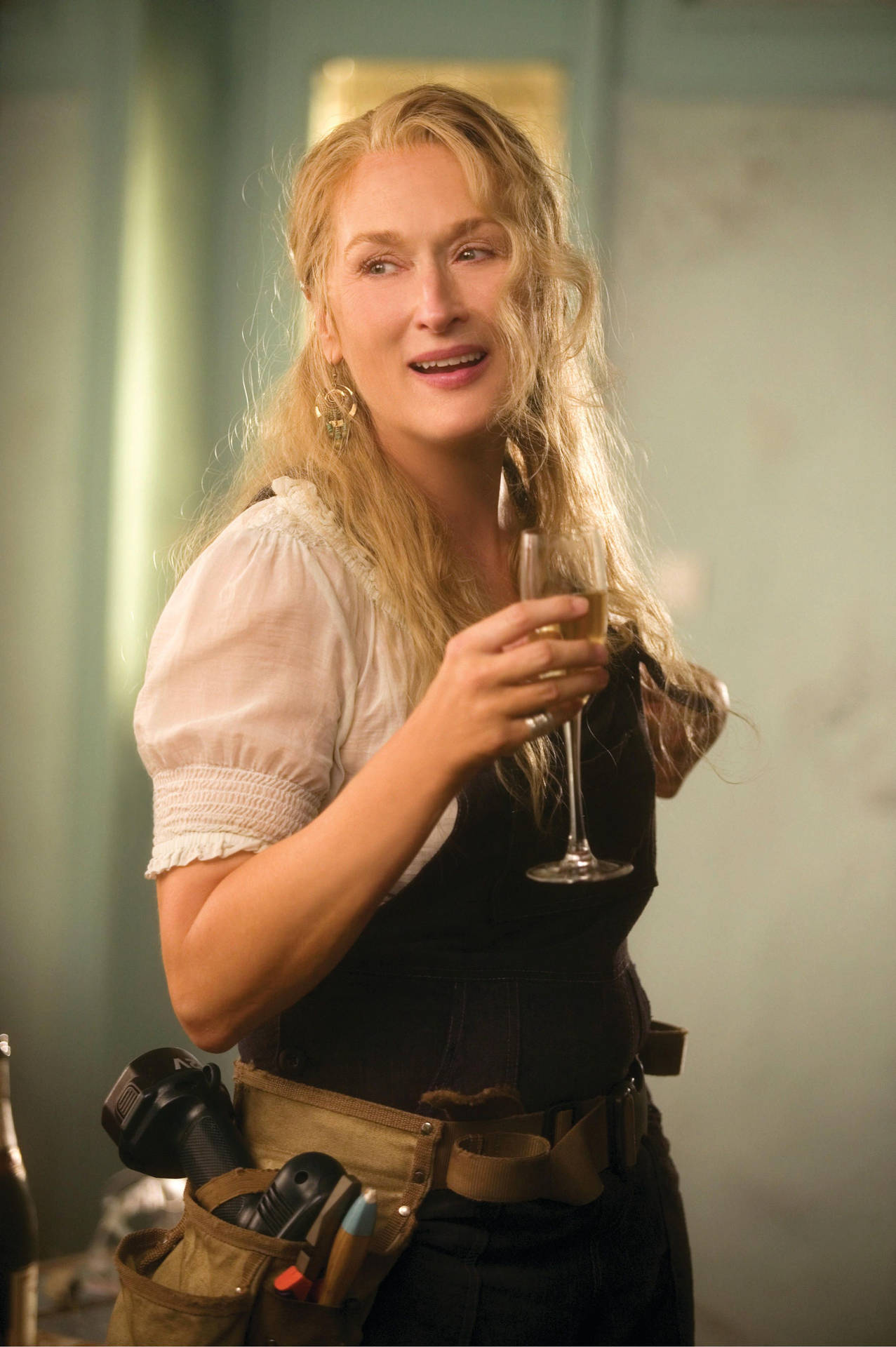 Meryl Streep Con In Mano Un Bicchiere Di Champagne Sfondo