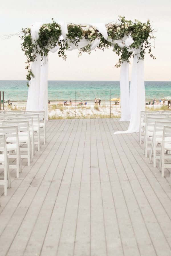 Mesmerizing Beach Wedding Moment Wallpaper