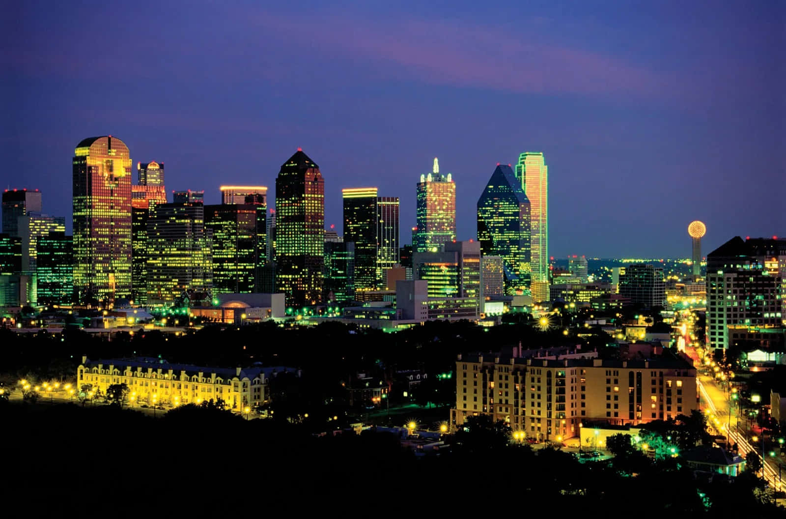 Mesmerizing Downtown Dallas Skyline At Night Wallpaper