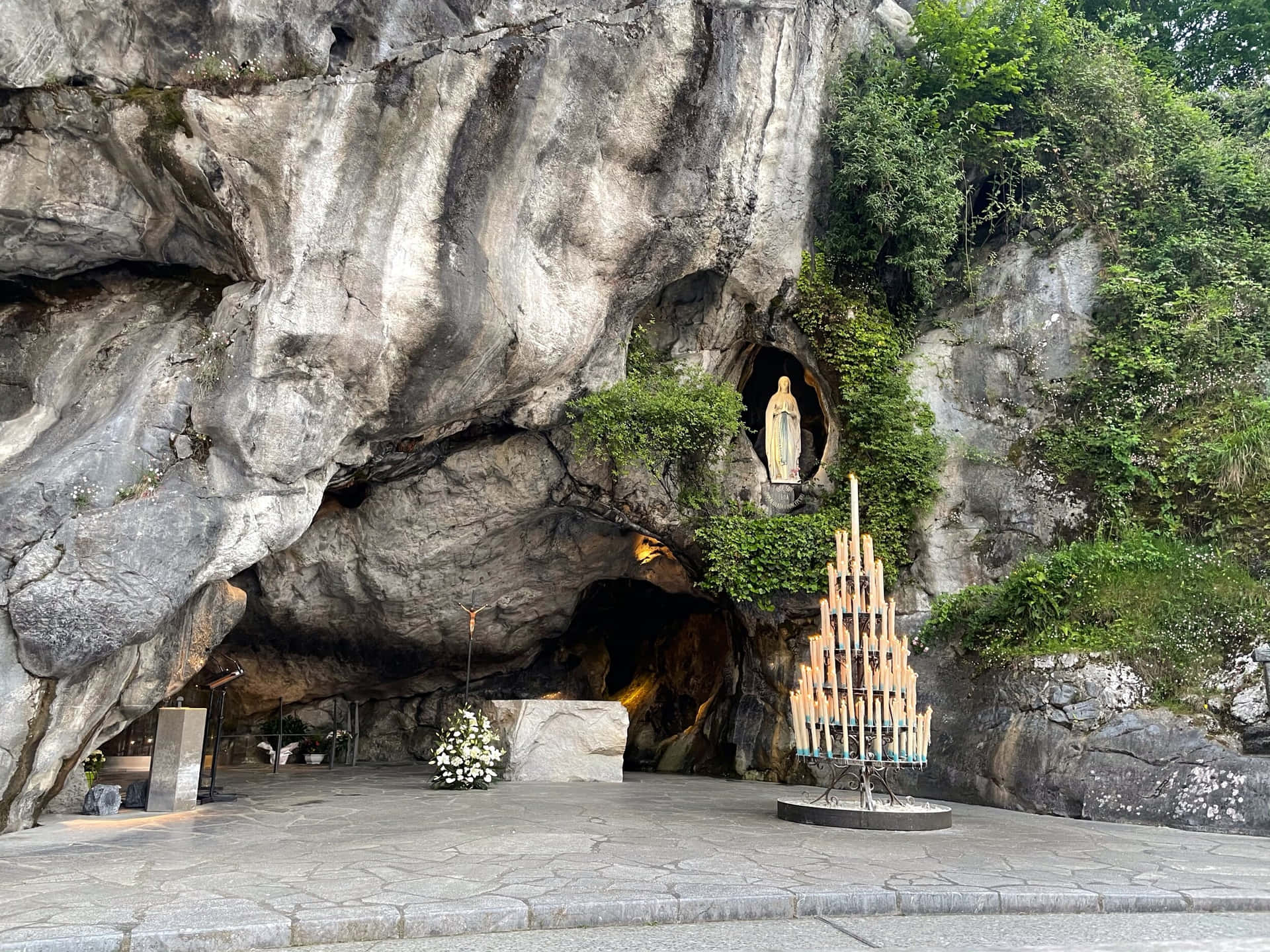 Mesmerizing View Of Lourdes Sanctuary At Dusk Wallpaper