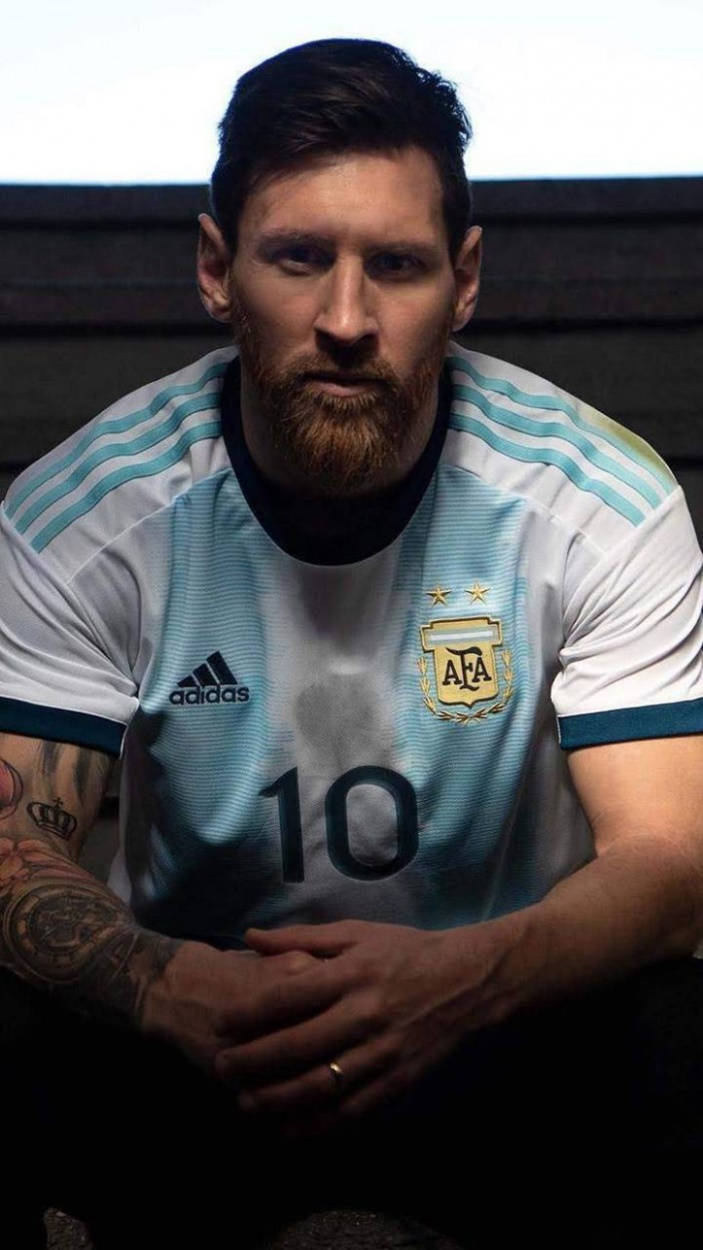 Messi Argentina Fierce Look skaber et brændende fodboldmiljø Wallpaper
