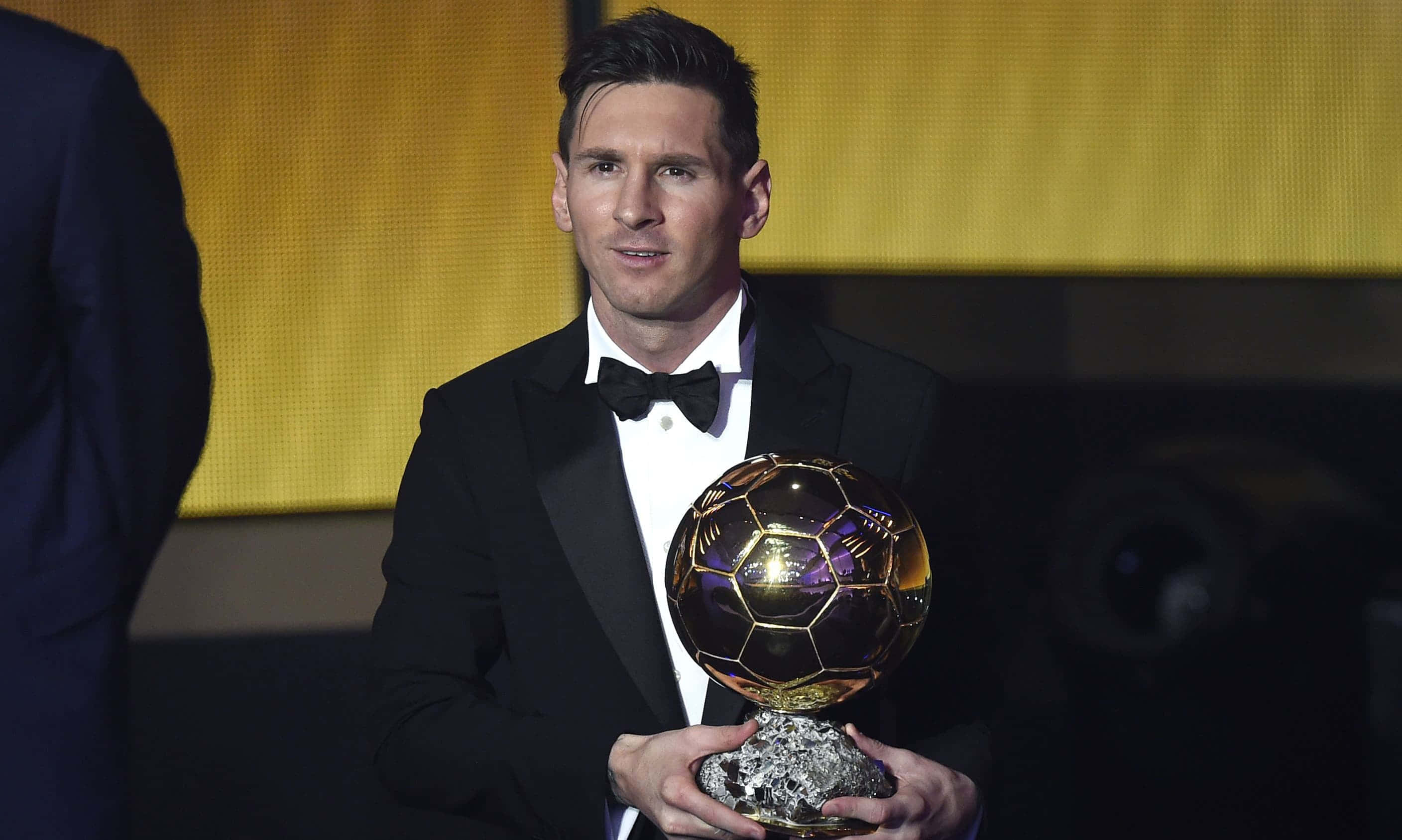 Messi Celebrating His Ballon D'or Moment Wallpaper