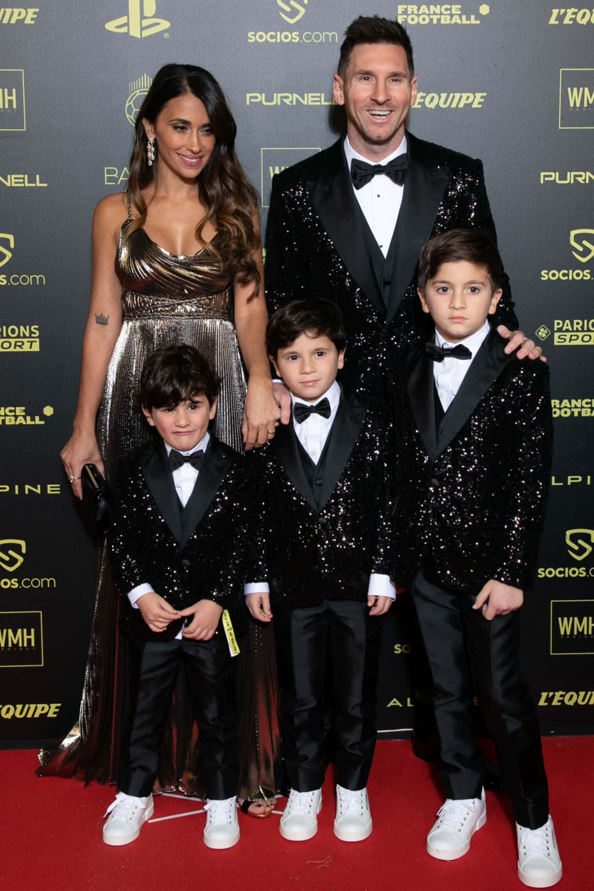 Messi Family Elegant Event Wallpaper