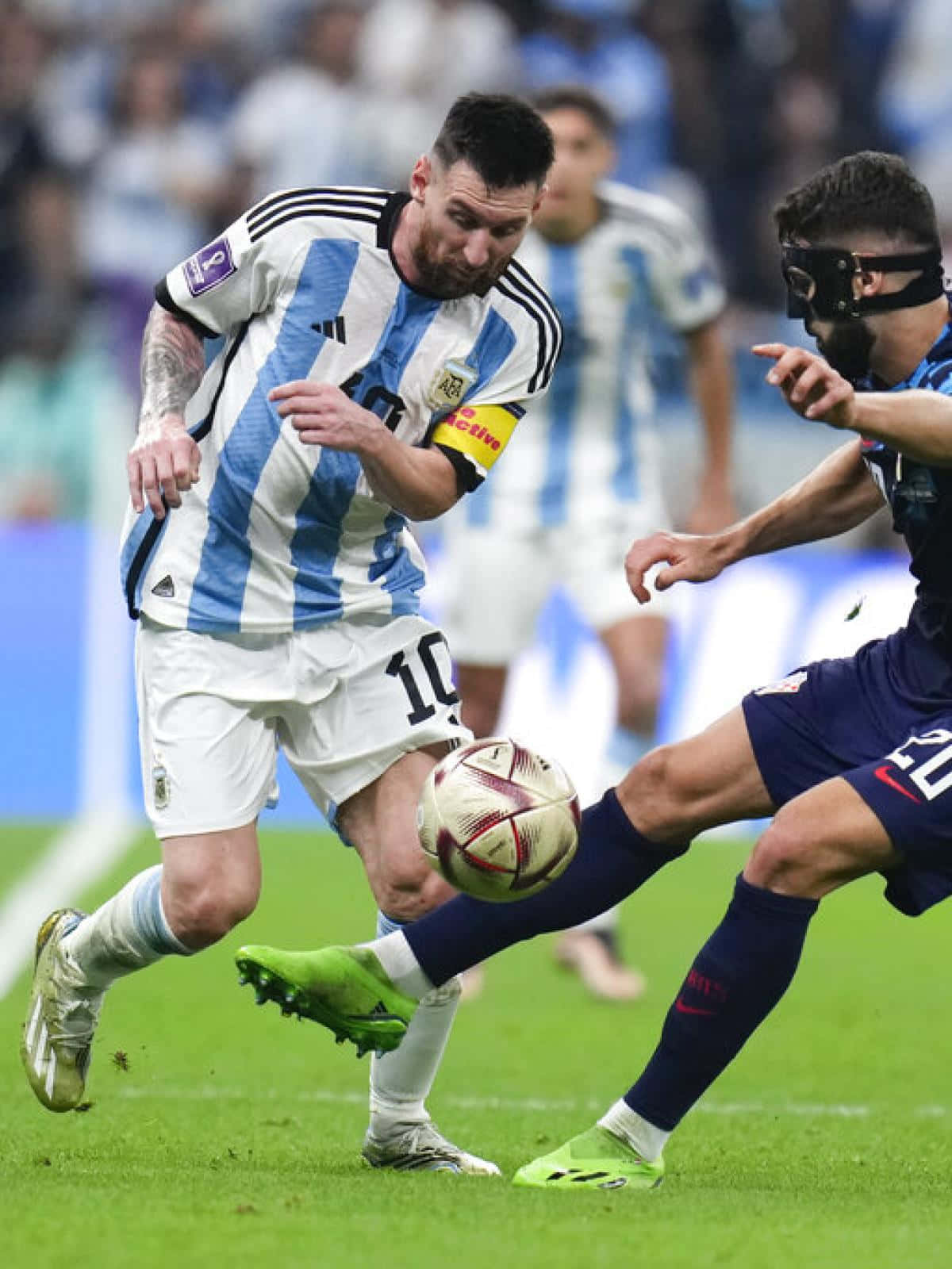Messi In Action Dribbling Past Defender Wallpaper