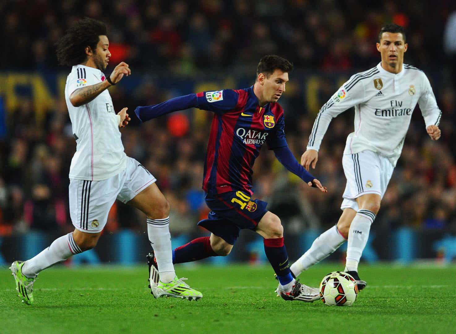 Messi In Action Dribbling Past Defenders Wallpaper