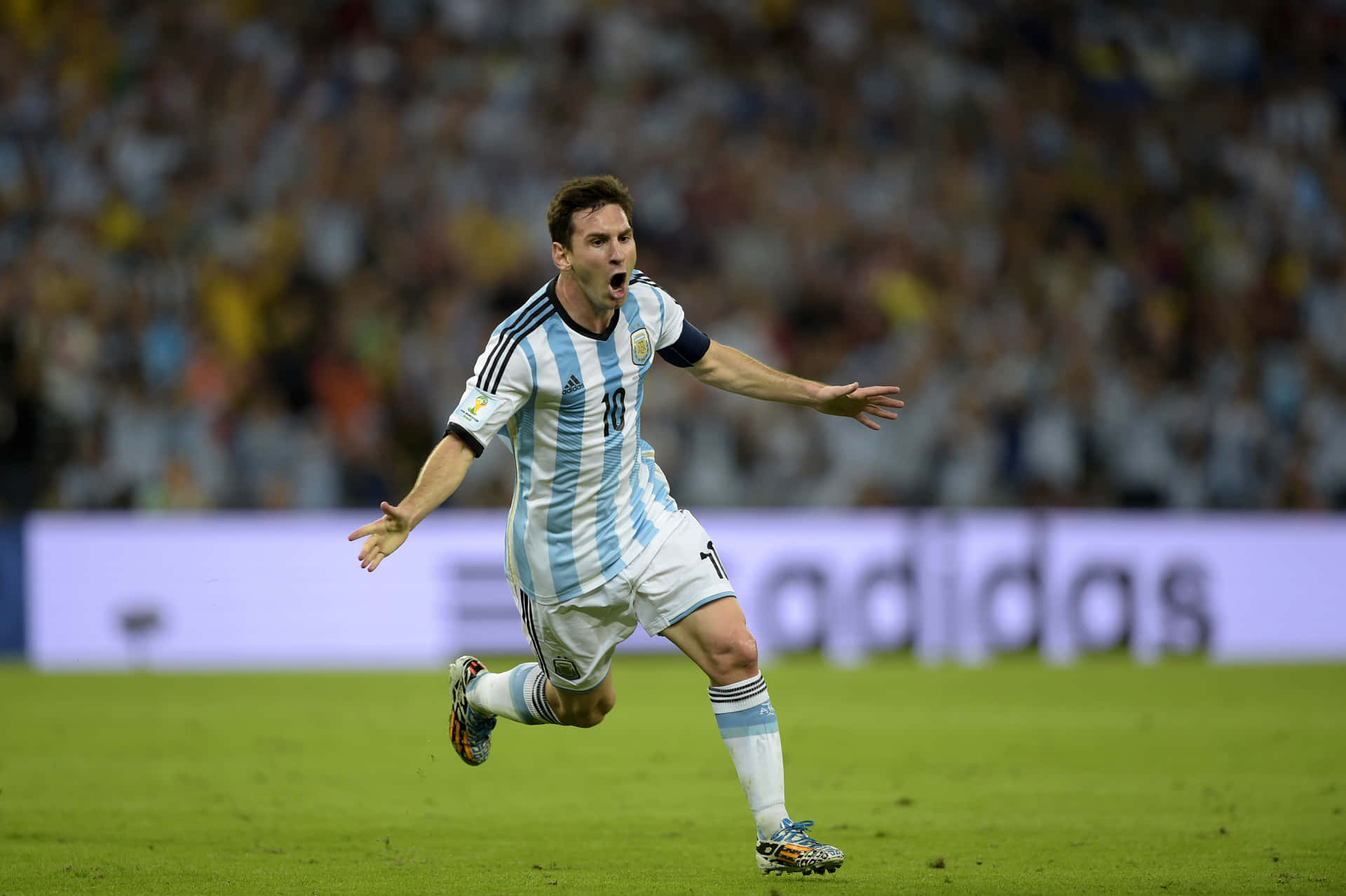Messi In Triumph: The Epitome Of Soccer Majesty Wallpaper