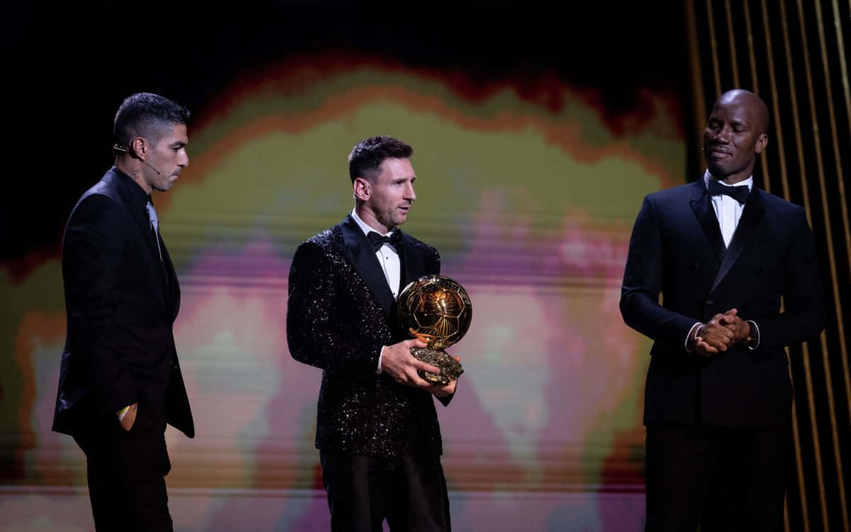 Messi Winning Ballond Or Award Wallpaper