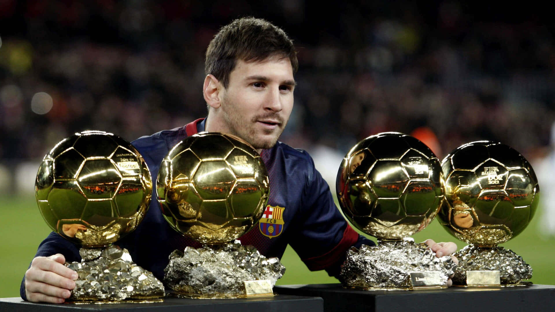 Messi_with_ Four_ Ballon_d Or_ Trophies Wallpaper