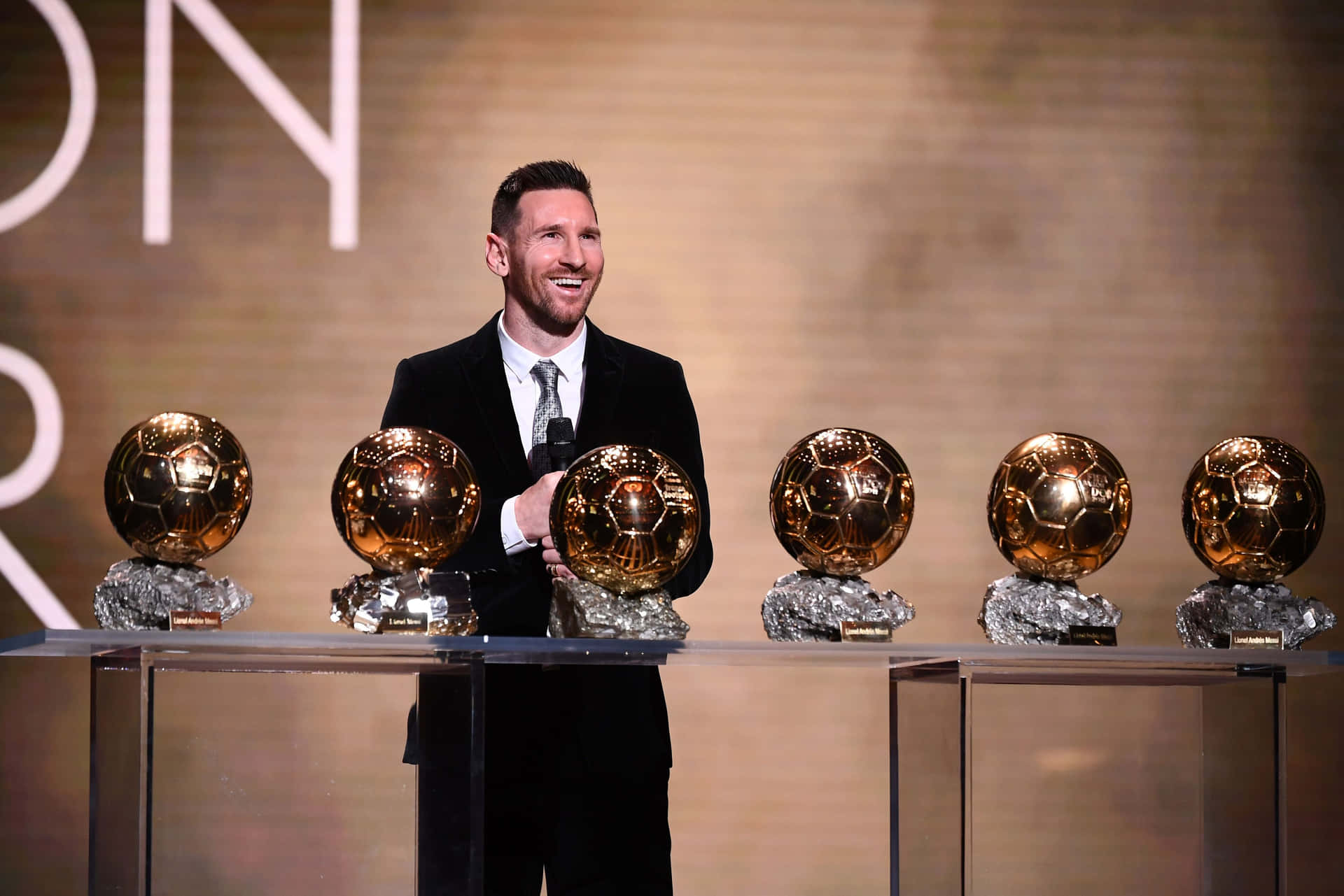 Messi_with_ Multiple_ Ballon_d Or_ Awards Wallpaper