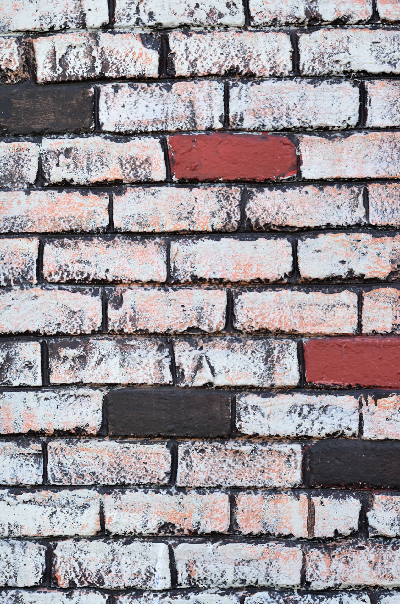 "Artistic Expressions Through a Colorfully Painted Brick Wall" Wallpaper