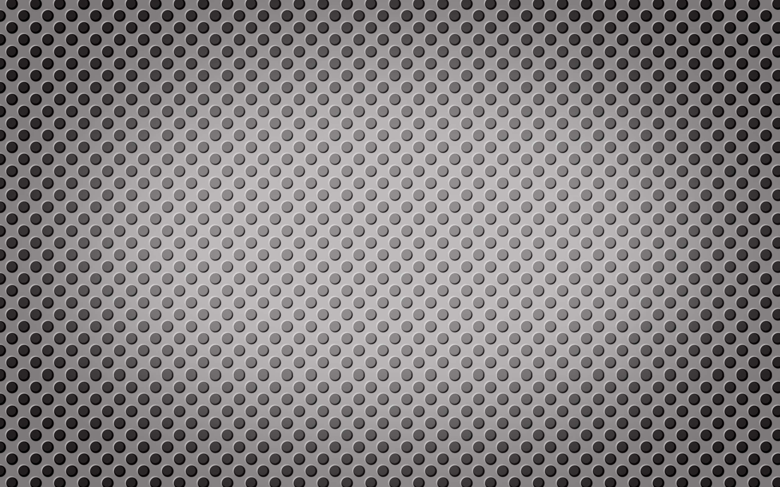 A Black And White Metal Mesh Background