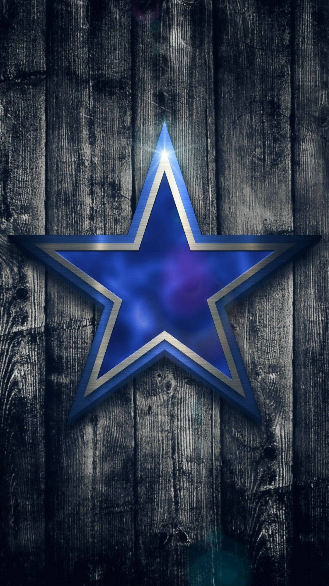 Metal Dallas Cowboys Logo On Wood Background Wallpaper