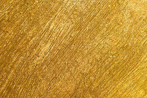 Offer Your Living Space a Simultaneously Stylish and Luxurious Look with Metallic Gold Wallpaper