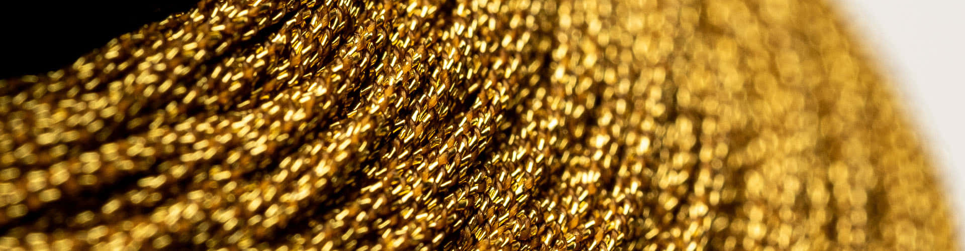 A Swirling Pattern of Pure Metallic Gold Wallpaper