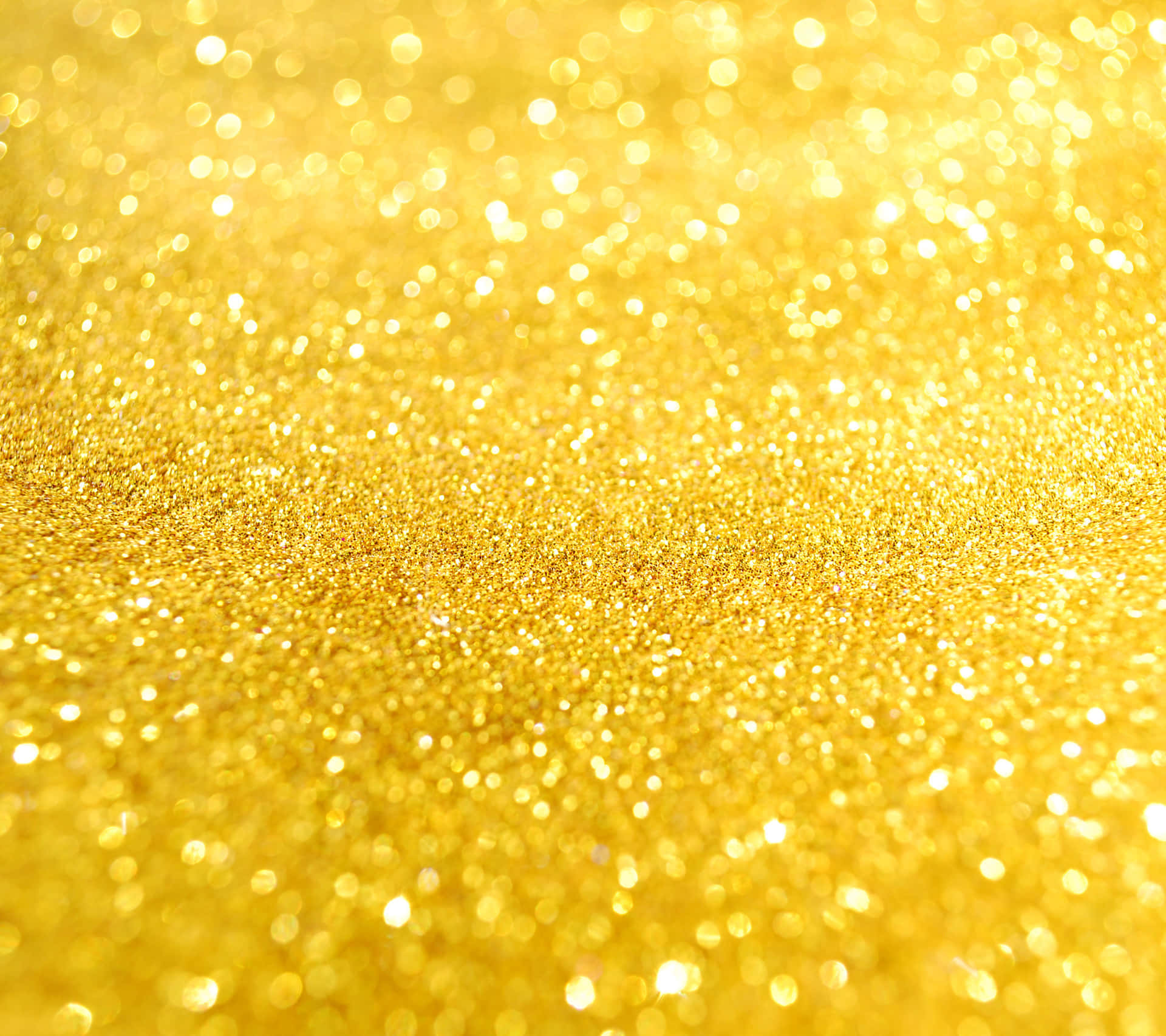 A Gold Glitter Background Wallpaper