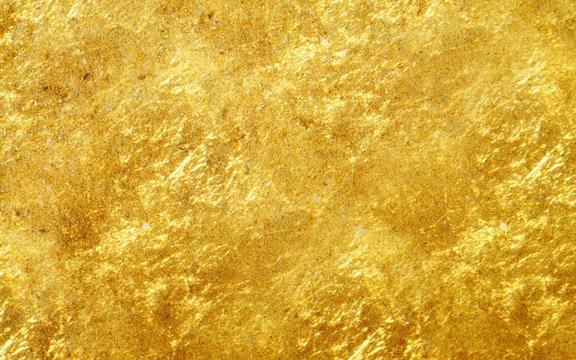 Shine Bright with Metallic Gold Wallpaper