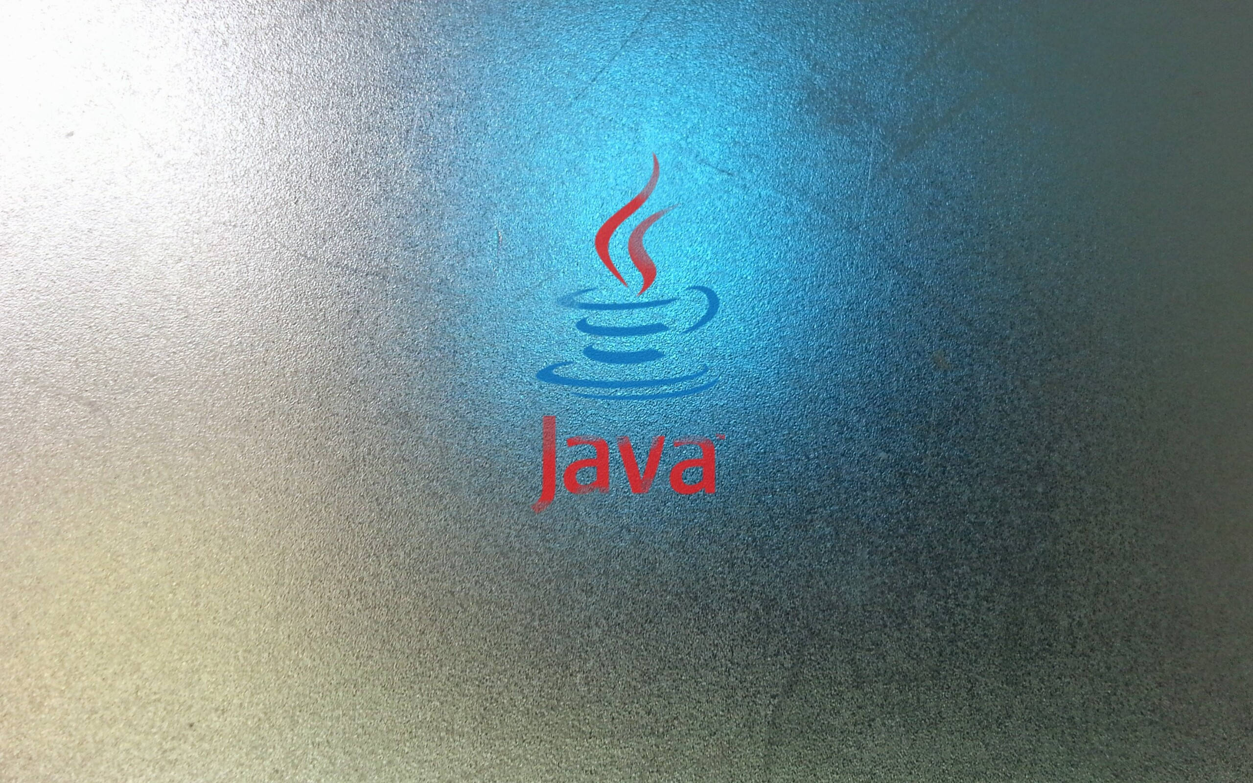 Metallic Java Programming Background Wallpaper — Java logo with red steaming cup and text on textured blue gradient background.
