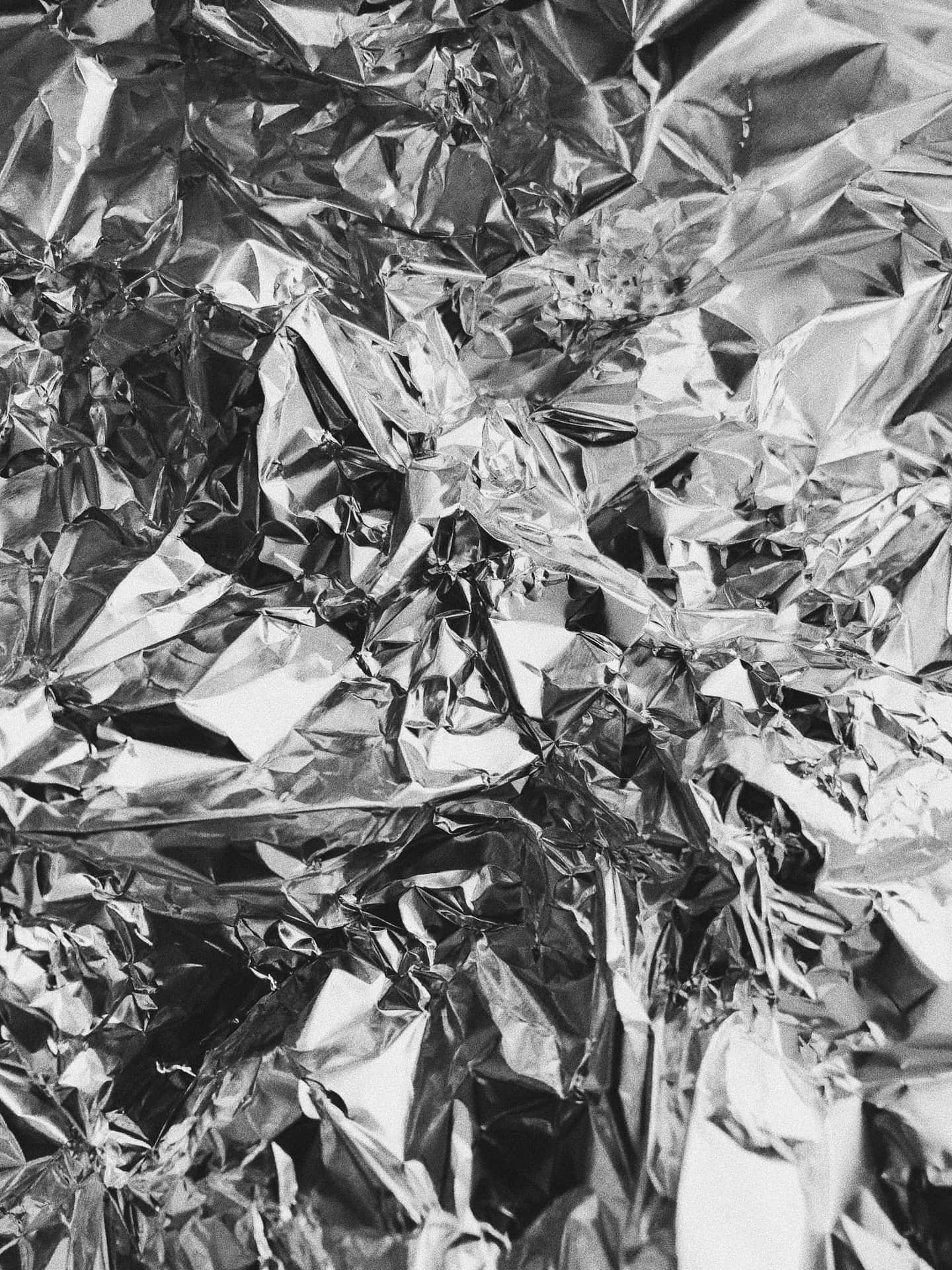 Metallic Silver Background Crumpled Foil Pattern