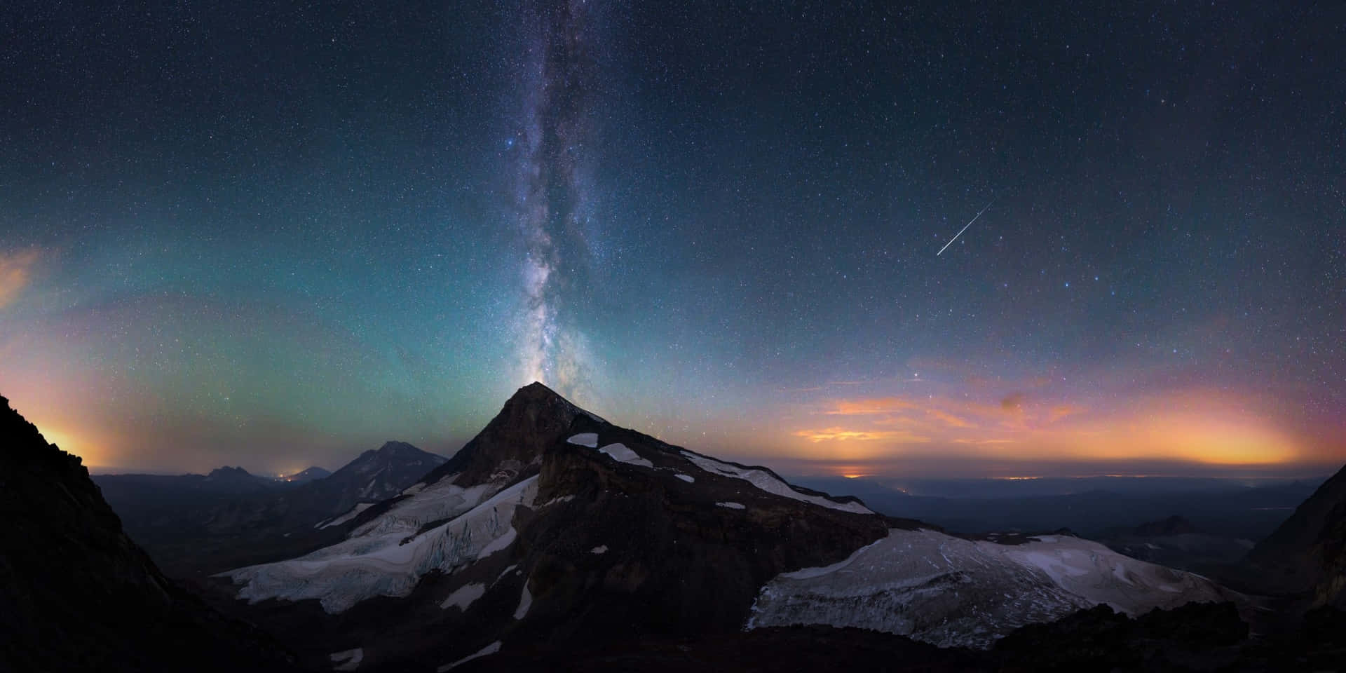 Stunning Meteor Shower in Night Sky Wallpaper