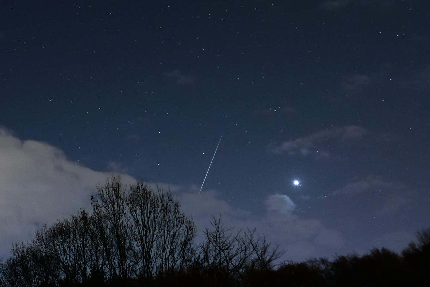 A Meteor Streaks Across The Sky