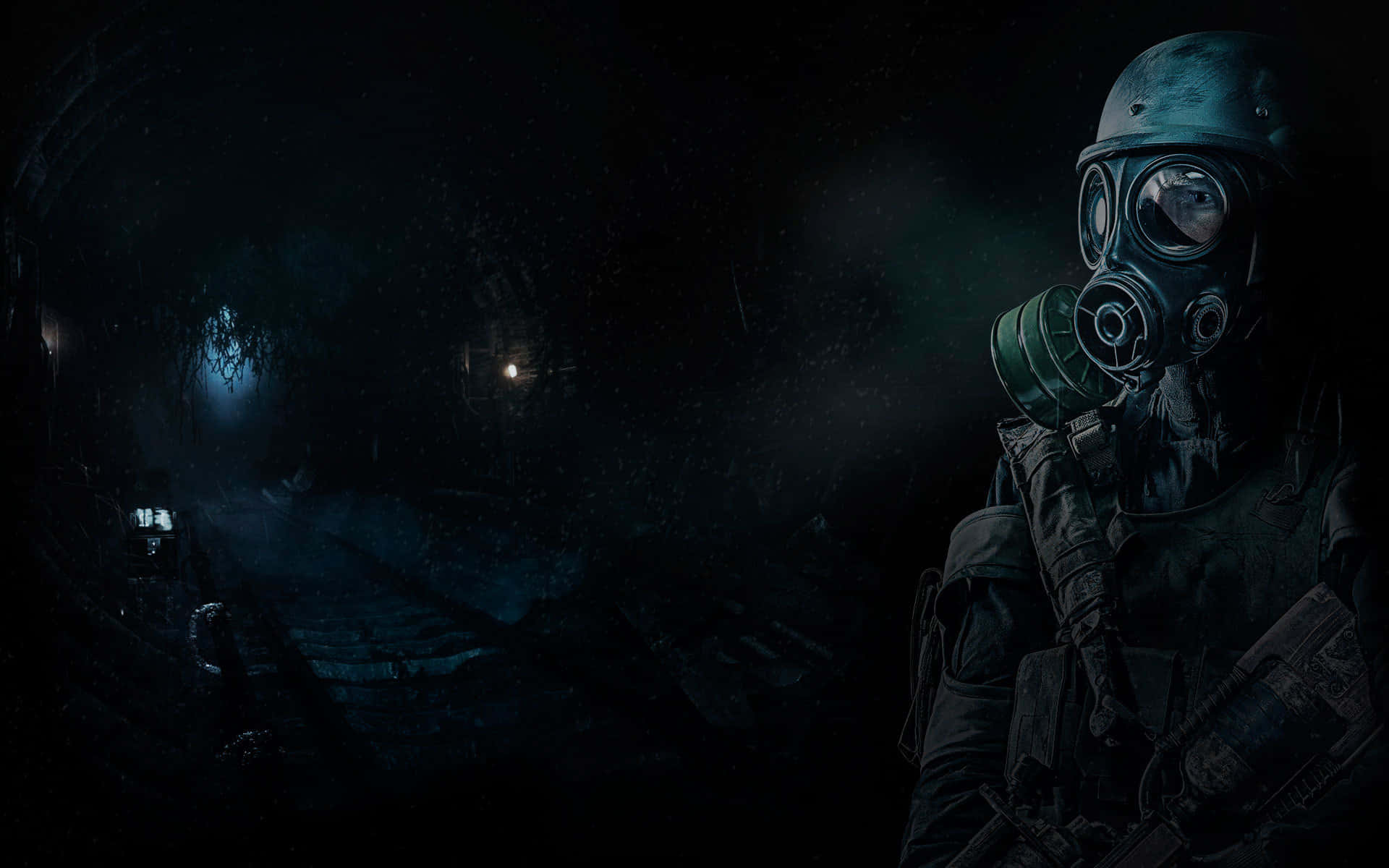 A Man In A Gas Mask Is Standing In A Dark Tunnel