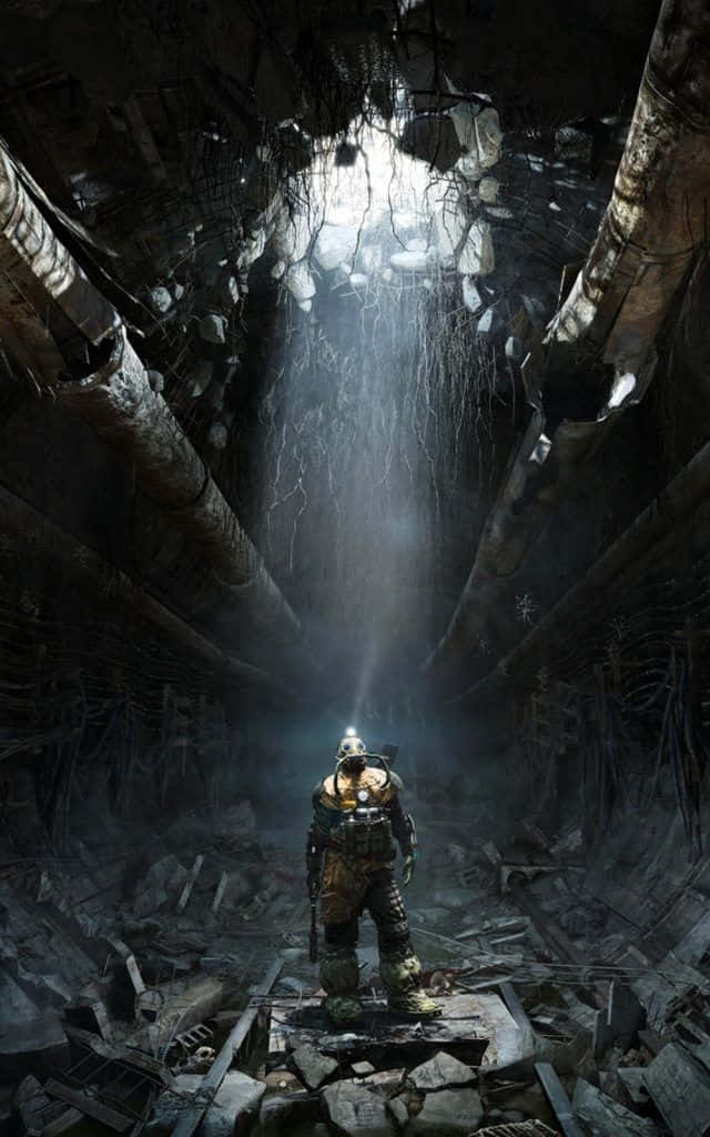 A Man Standing In An Underground Tunnel Wallpaper