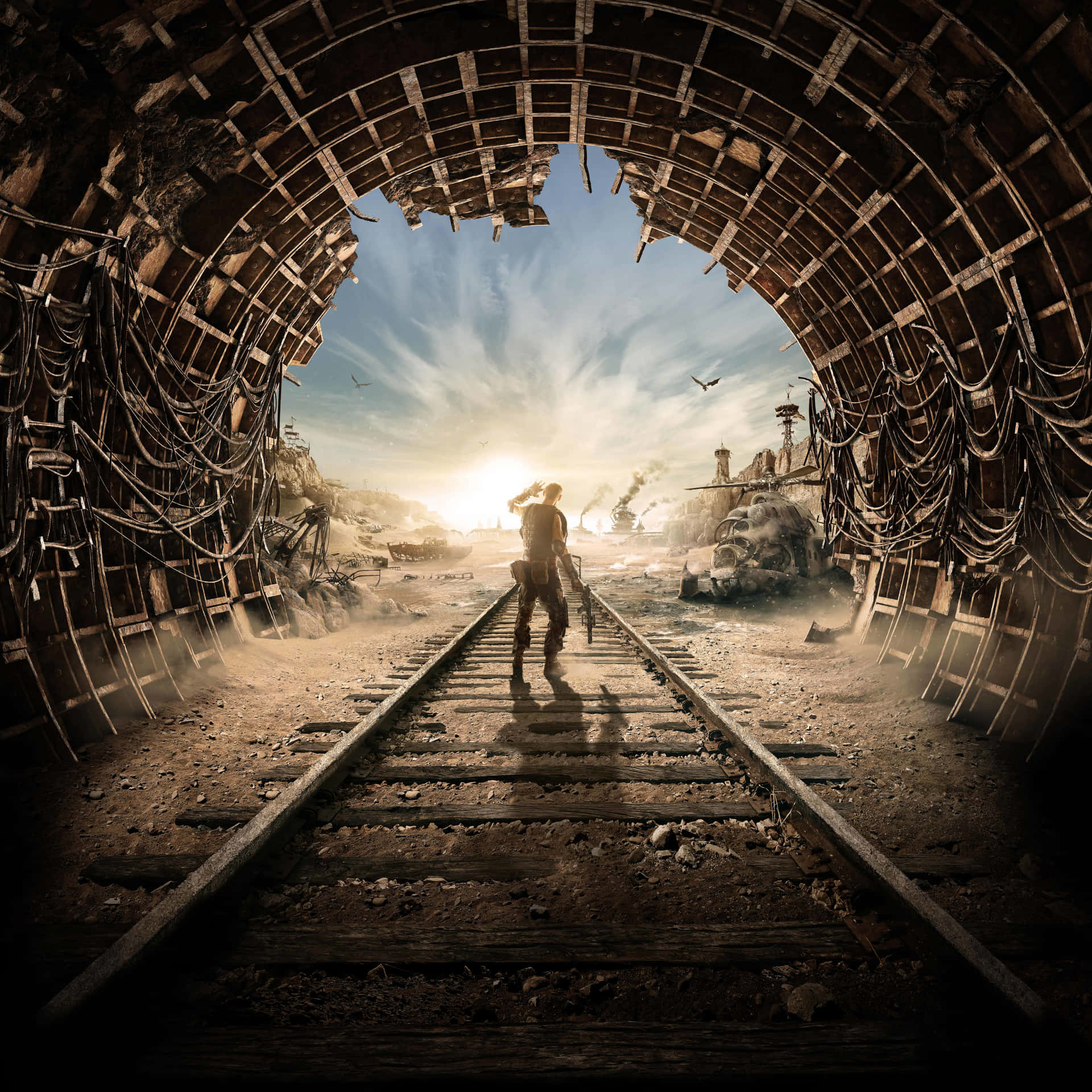 A Man Is Standing In A Tunnel With A Train Wallpaper