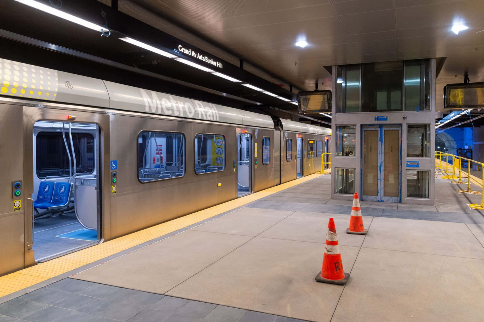 A Subway Train Is Waiting At A Station