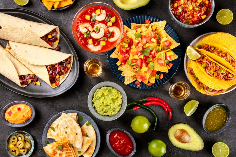 A Variety Of Mexican Food On A Dark Background