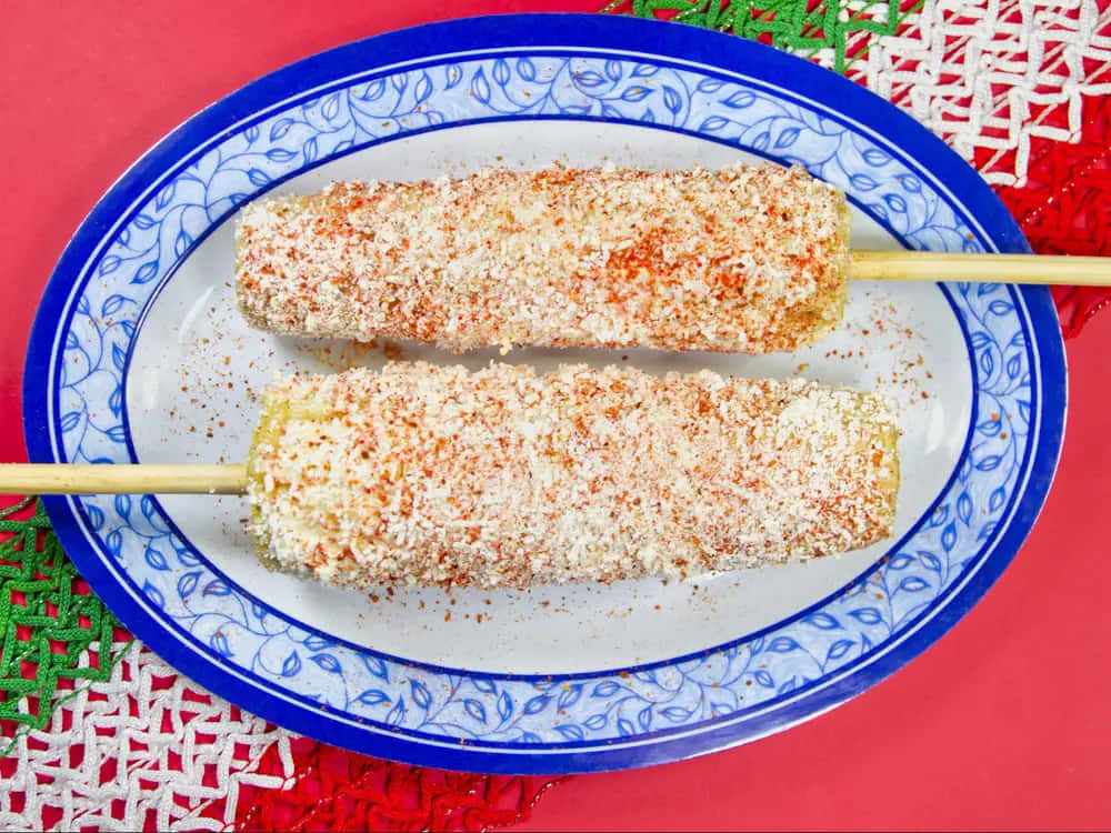 Two Corn On The Cob On A Plate