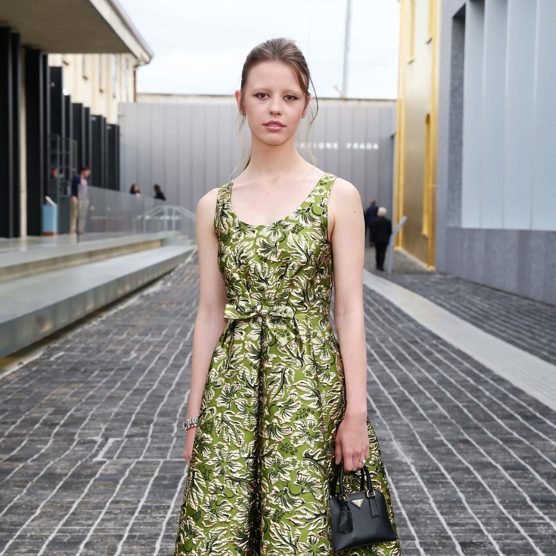 Mia Goth Green Floral Dress Urban Backdrop Wallpaper