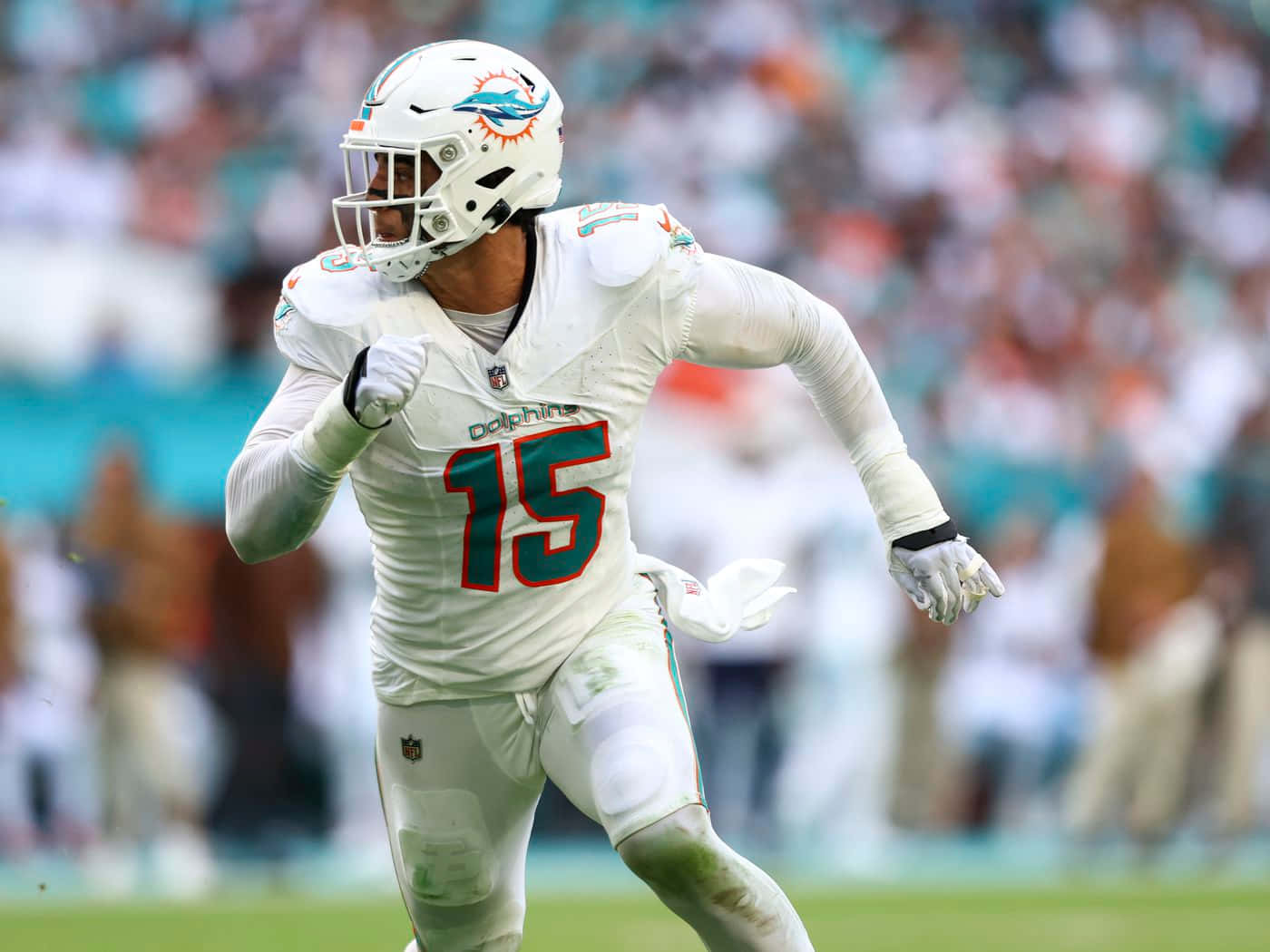 Miami Dolphins Player Number15 In Action Wallpaper