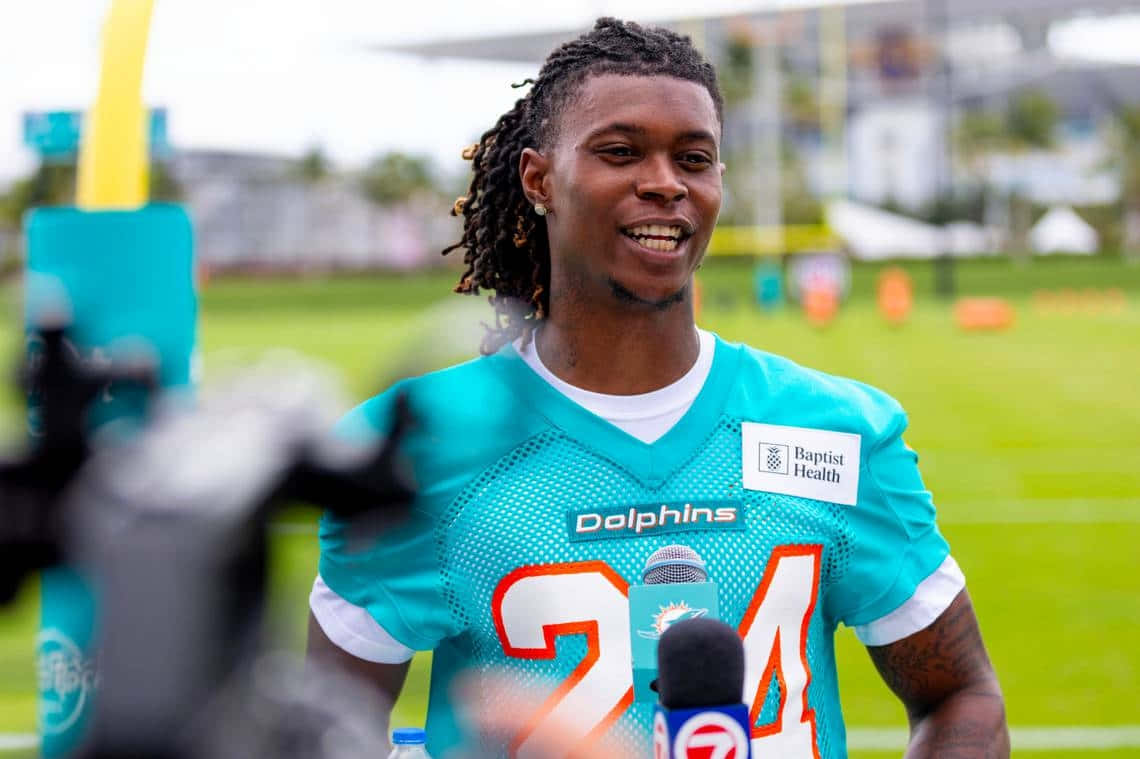 Miami Dolphins Player Smiling During Interview Wallpaper
