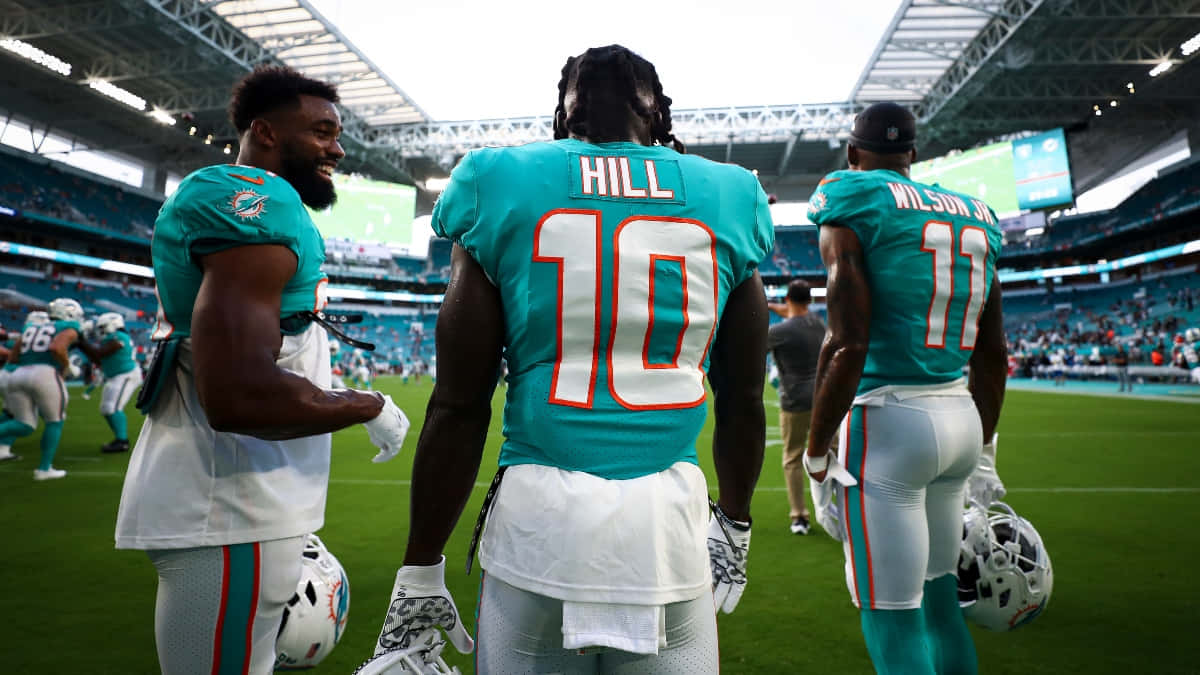 Miami Dolphins Players On Field Wallpaper