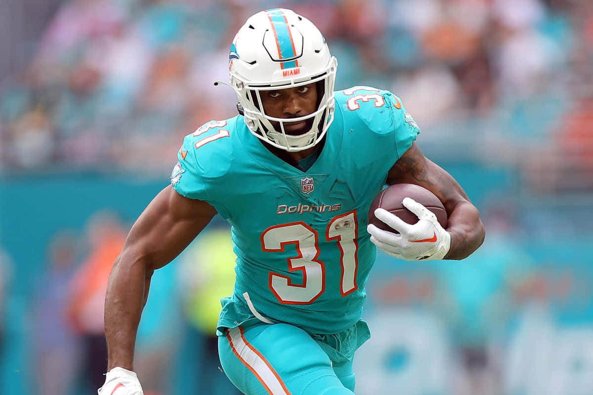 Miami Dolphins Running Back Action Photo Wallpaper