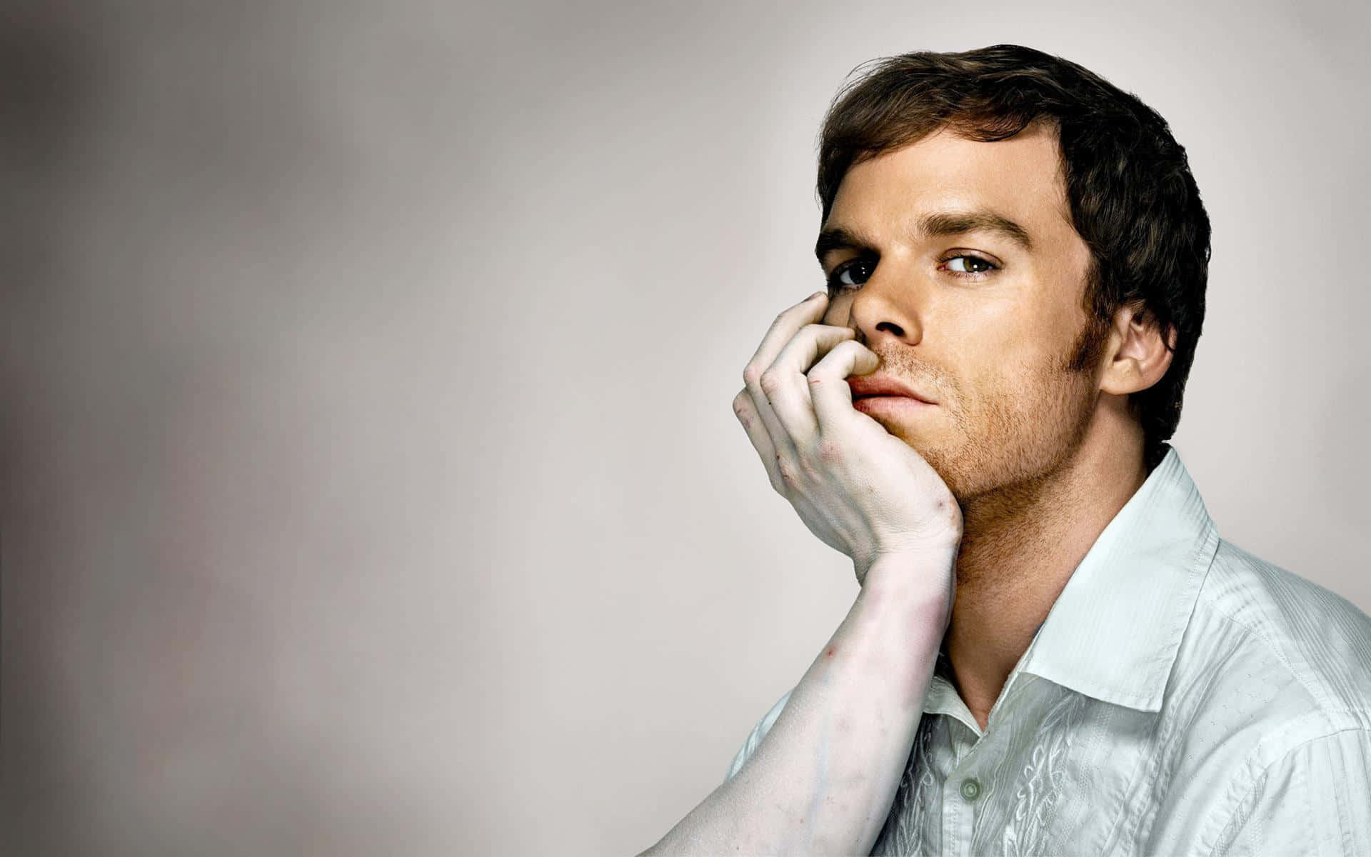 Michael C. Hall in his iconic role as Dexter Morgan Wallpaper