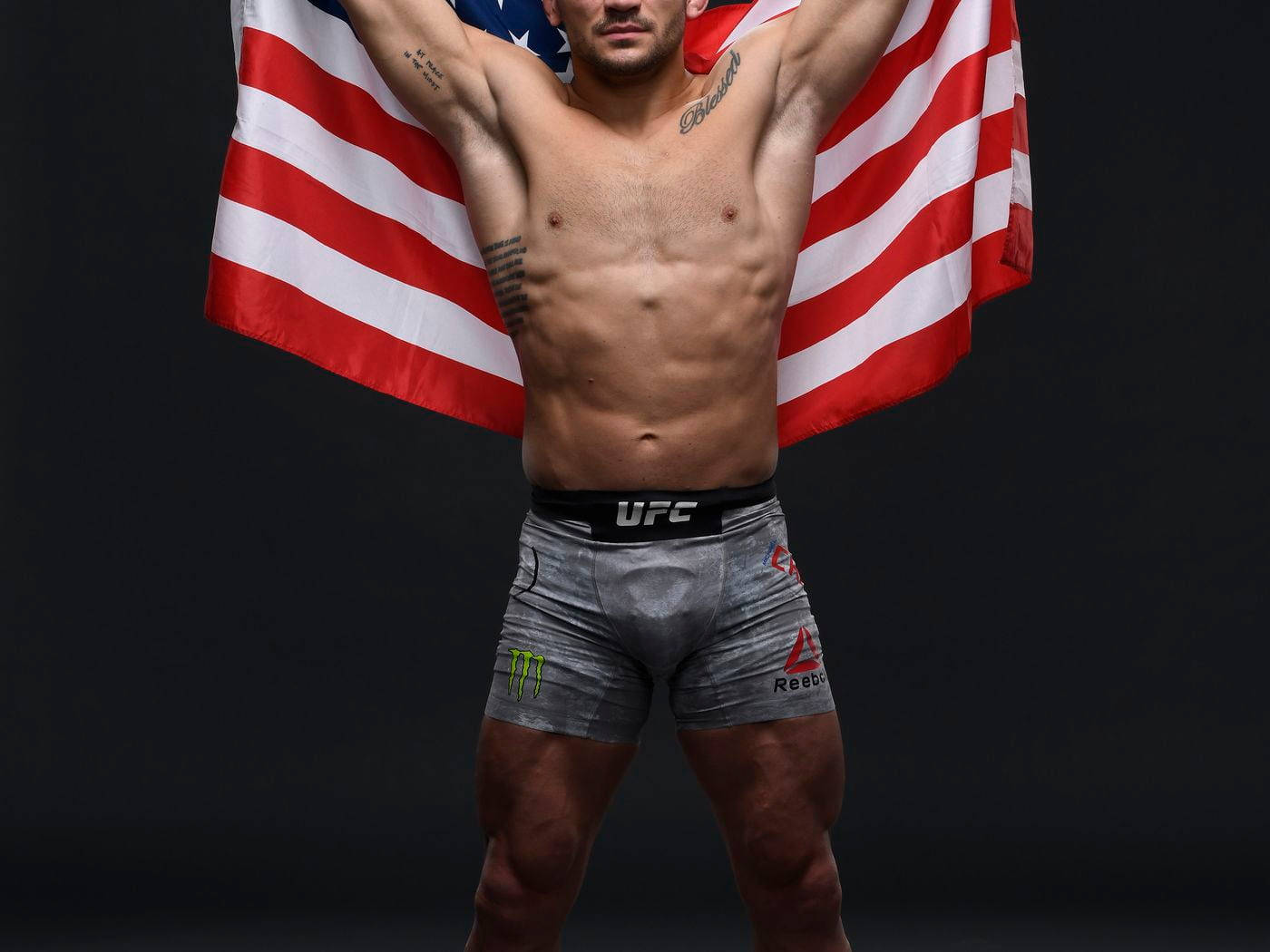 Michael Chandler Holding Up American Flag Wallpaper